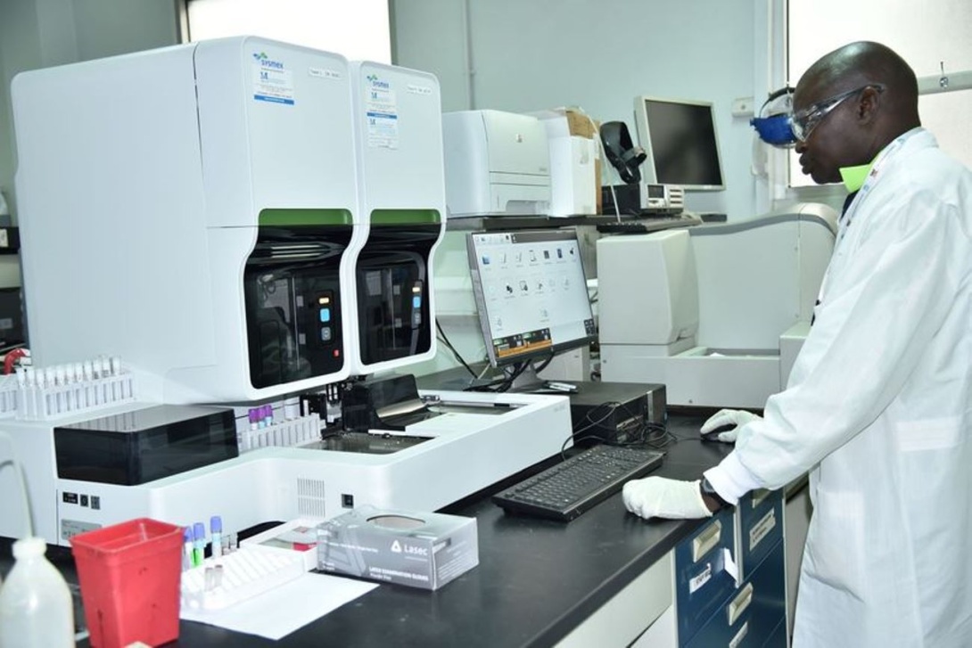 A Male Staff in the state-of-the-art Infectious Diseases Institute (IDI) Core Lab, Makerere University, Kampala Uganda, East Africa. Established in 1989, the IDI Core Lab has since 2003 been internationally certified by the College of American Pathologists (CAP) and is accredited by the Uganda Ministry of Health (MoH) as a lead partner in strengthening laboratory systems.