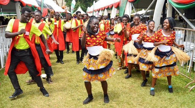 Students of Performing Arts and Film perform the Owaro Traditional Dance from Eastern Uganda as they lead the Chancellor's Procession at the 69th Graduation of Makerere Univeristy in January 2019. Kampala Uganda, East Africa.