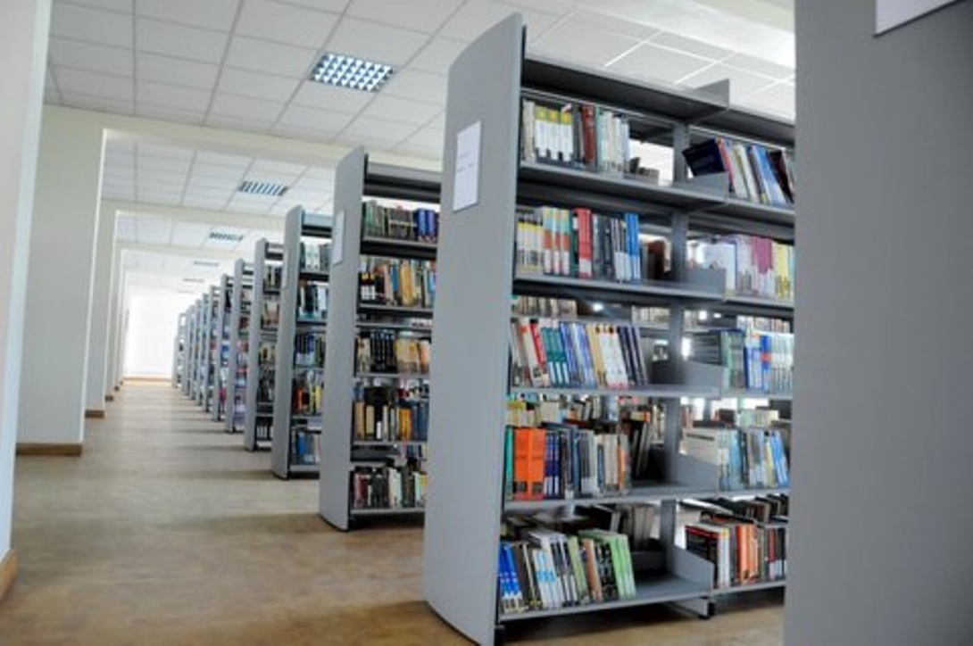 Aisles of books in the Main Library, Makerere University.