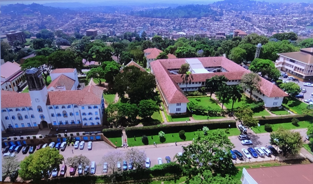 An aerial photo of Makerere University Left to Right: St. Francis Chapel, Main Building, School of Agricultural Sciences-CAES, JICA Building-CoNAS, In the background Mary Stuart Hall Tower, Part of Namirembe Hill, Kikoni area, and part of Kasubi Hill, Kampala Uganda, East Africa. Photo: CAES.