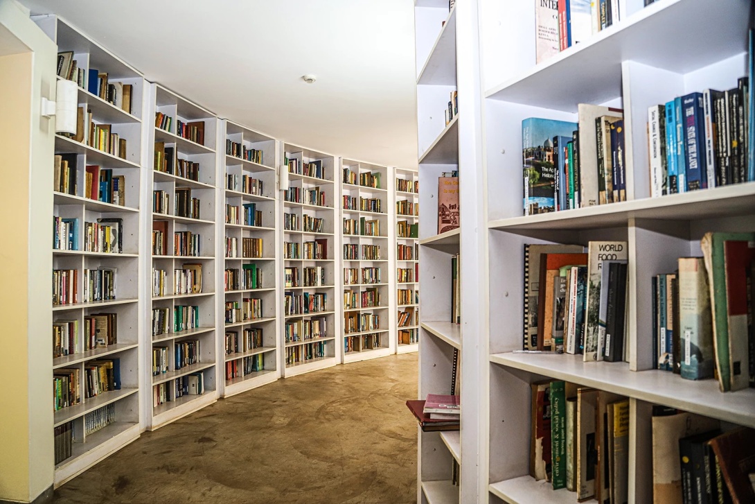Bookshelves in the Makerere Institute of Social Research (MISR) Library, Kampala Uganda, East Africa.